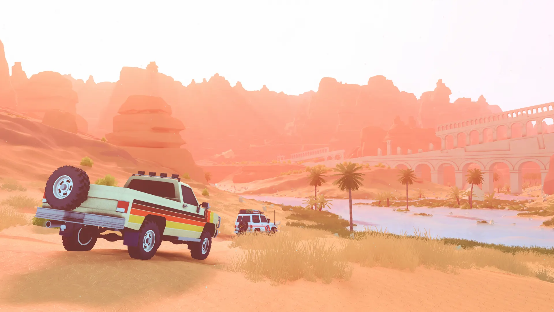 A pickup truck with a spare wheel on its bed in the Algerian desert in over the hill